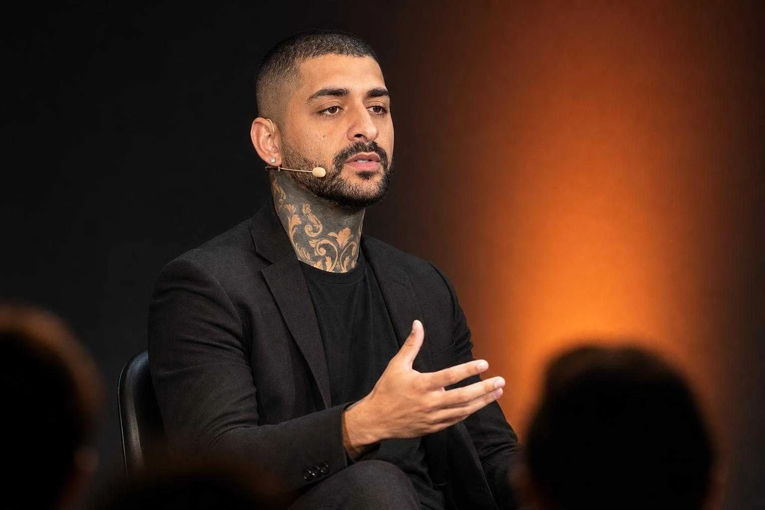 Matheus Cardoso, fundador da Opus, falando em um painel